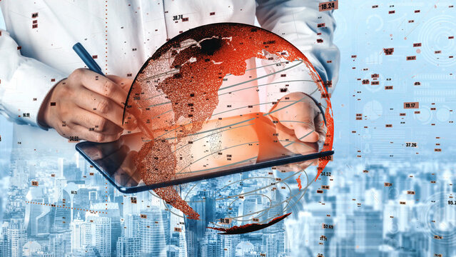 A business professional engages with a tablet device while an overlay of a digital world map illustrates global connectivity. Ideal for technology and business themes. Xenic