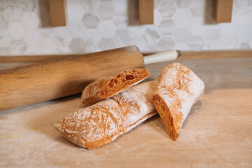 Ciabatta Bread with a Hint of Tomato isolated on Wooden background side view of italian Baked Food