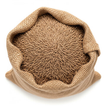 Top view of cumin seeds in large burlap sack isolated on white