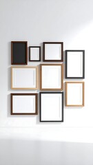 Various sized picture frames on a wall
