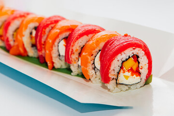 Delicious sushi rolls arranged neatly on a serving tray with vibrant colors