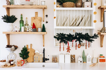 Charming holiday kitchen decor with festive elements and natural textures near the sink area