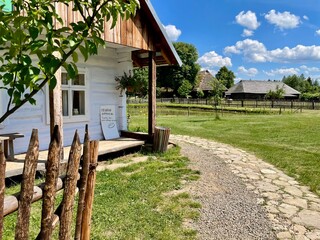 Fototapeta premium Old wooden shop in the european village 