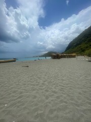 Peaceful Coastal Rest Stop with Clear Blue Sky

