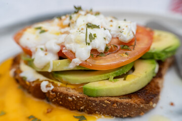 Delicious avocado toast topped with fresh ingredients