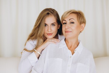 Mother and Daughter Sharing a Moment of Affection
