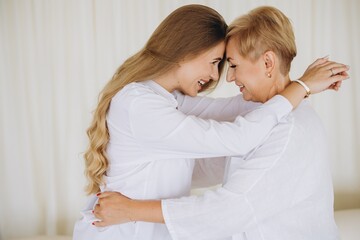 Mother and Daughter Sharing a Tender Moment of Affection