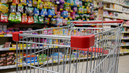 Close-up of a shopping trolley in sweets department
