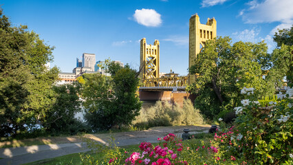 golden Tower Bridge over the Sacramento River. The bridge is the western downtown entry point to...