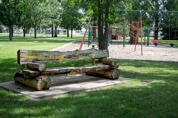 Rustic Log bench at playground