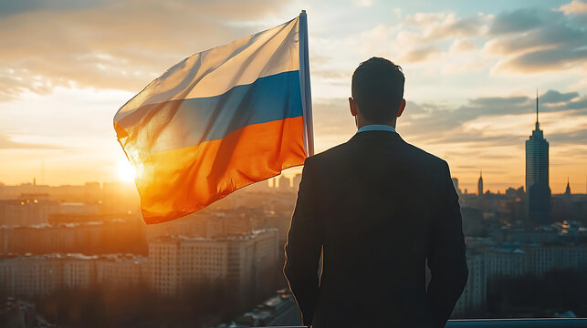 Businessman Contemplating the Future Against the Russian Flag at Sunset Over Moscow Skyline