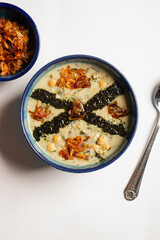 Traditional Persian Erbal Soup with Fried Onion ( Ashe-Doogh ) 