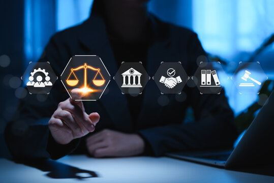 Law and Justice Concept. A suited legal professional touches virtual icons symbolizing law, justice, legal services. lawyer, business legislation, notary public, online legal advice, practice of law,