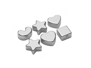 Shiny metal shapes including stars, hearts, and squares arranged on transparency background, creating playful and modern aesthetic. These geometric forms can be used for various creative projects