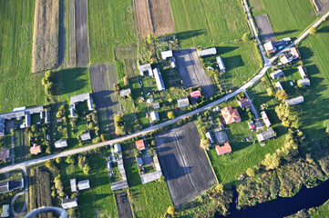 Aerial drone view of a vast patchwork of farmland in the Polish countryside, scenic rural landscape