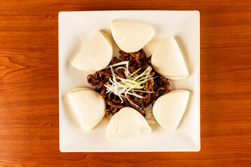 Szechuan shredded pork buns