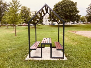Modern House-Frame Pergola Picnic Table in Urban Park