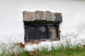 Old window on white wall. 