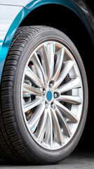 Detailed close-up of a stylish car wheel design with deep metallic finish