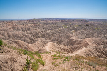 Panoramic view of rugged terrain and erosion in Badlands National Park, South Dakota