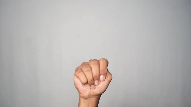 An unknown hand with a symbol asking for help