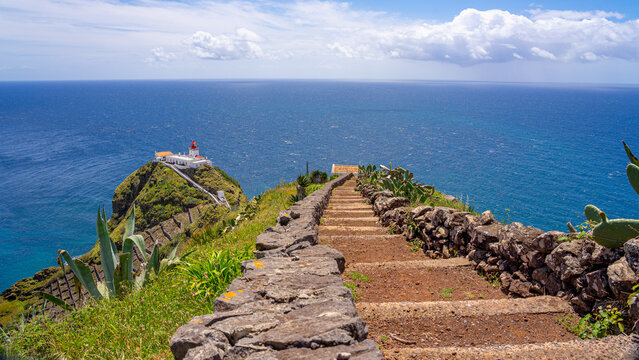 Pedestrian path with a view of the top of the Gon&ccedil;alo Velho lighthouse in Santa Maria-Azores-Portugal.