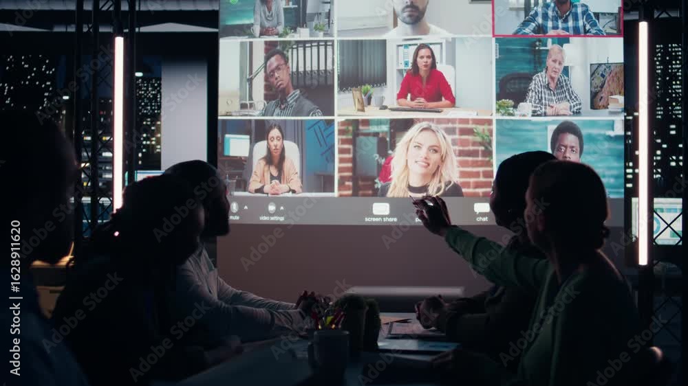 Poster professionals collaborate with remote investors across time zones in after hours session, exchanging