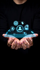 Hands Holding Futuristic Hologram of Connected Devices and User Icons Representing Digital Network and Communication Technology