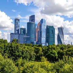 Fototapeta premium Modern city skyline behind lush trees