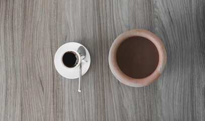 cup of coffee on wooden table