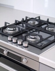 Stainless steel gas stove with four burners