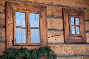 Windows of a log cabin.Closeup image