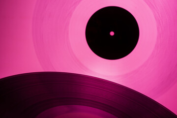 Musical color background with vinyl records. close-up of vinyl discs with texture for music banner...