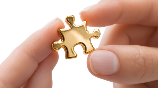 Close-up of fingers holding a shiny golden puzzle piece, symbolizing problem solving, strategy, uniqueness, success, and finding the missing piece, isolated on white background.


