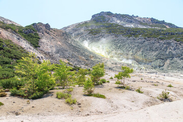Volcanic landscape with sulfurous steam vents, Mount Lo, Akan, Hokkaido, Japan