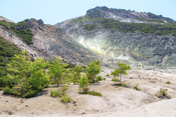 Volcanic landscape with sulfurous steam vents, Mount Lo, Akan, Hokkaido, Japan
