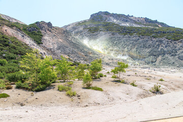 Volcanic landscape with sulfurous steam vents, Mount Lo, Akan, Hokkaido, Japan