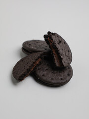 Black biscuits isolated on white background