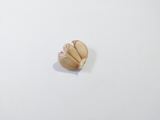 Single Garlic Bulb on White Background