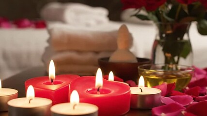 Romantic Spa Setting: Glowing Candles & Rose Petals