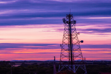 Vertical High voltage pole electric wiring distribution landscape energy engineering. Electricity...