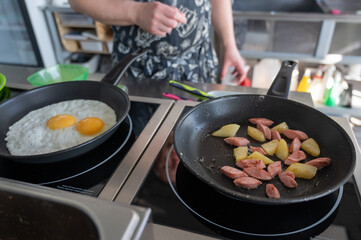 The chef fries the eggs sunny side up. 