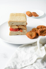 Akara and bread on a white plate, nigerian akara fried beans cake and bread on a plate