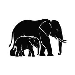 Silhouette of a mother elephant and her calf walking together