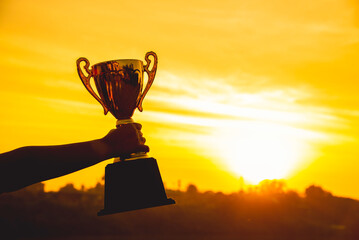 Sport Silhouette trophy best man Winner Award victory trophy for professional challenge. Golden Trophy cup champion contest win sport award reward gold prize. Win-Win business conquering Challenge
