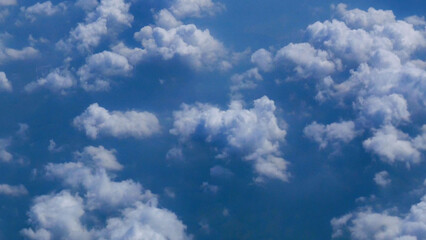 Blue sky fluffy white clouds on summer season bright clear skyline with beautiful cloudscape. Panorama blue sky clouds pattern on daylight with copy space. Cumulus cloudscape air climate sunny day