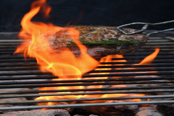 Vertical Horizon BBQ Barbecue grilled meat stick fire flame hot charcoal cooking outside. Vertical Beef grilling picnic outdoor smoke bacon spicy sausage for party. Grill pork bbq fire flame Party