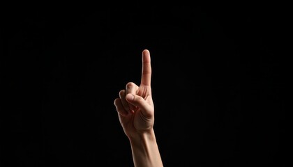 A single finger points upward against a stark black backdrop