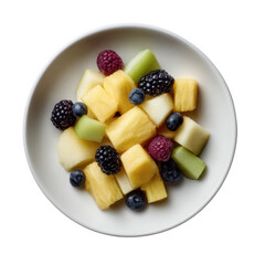 A vibrant mix of fresh fruits, including pineapple, cantaloupe, honeydew, blueberries, blackberries, and raspberries, arranged beautifully on a white plate against a white backgrou