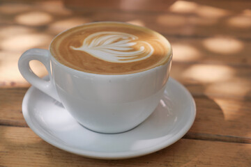 Warm latte art in a cozy cafe setting